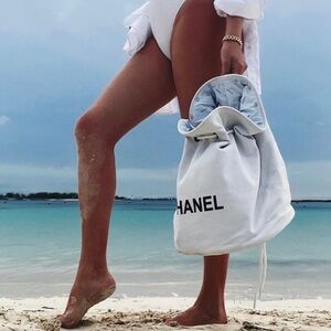 Last one SMALL CHANEL GWP White Canvas Drawstring Bag with Black Logo